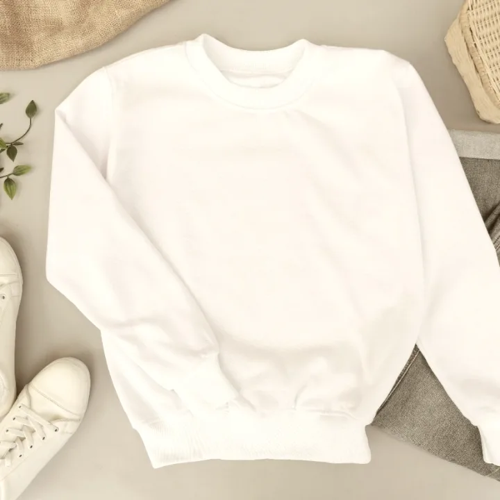 White crewneck sweatshirt photographed flat