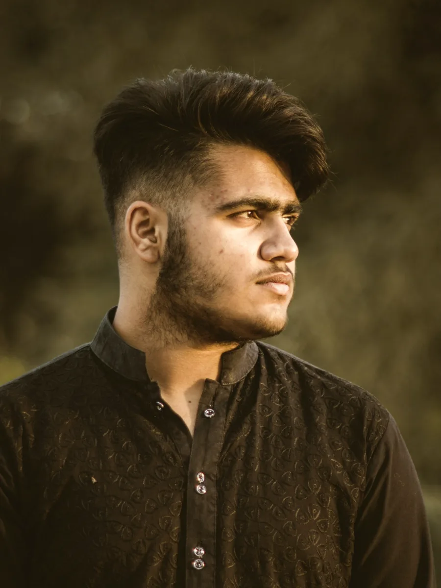 Man in a black embroidered kurta shirt